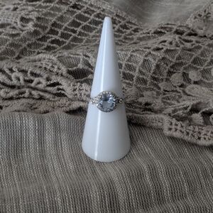 Elegant Silver Ring with Light Blue Gemstone